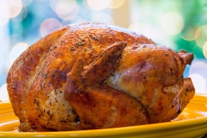 Cooked Turkey on Yellow Platter Closeup
